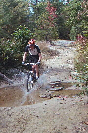 Crossing Tom Creek on the Eastern Slickrock ride at DSF